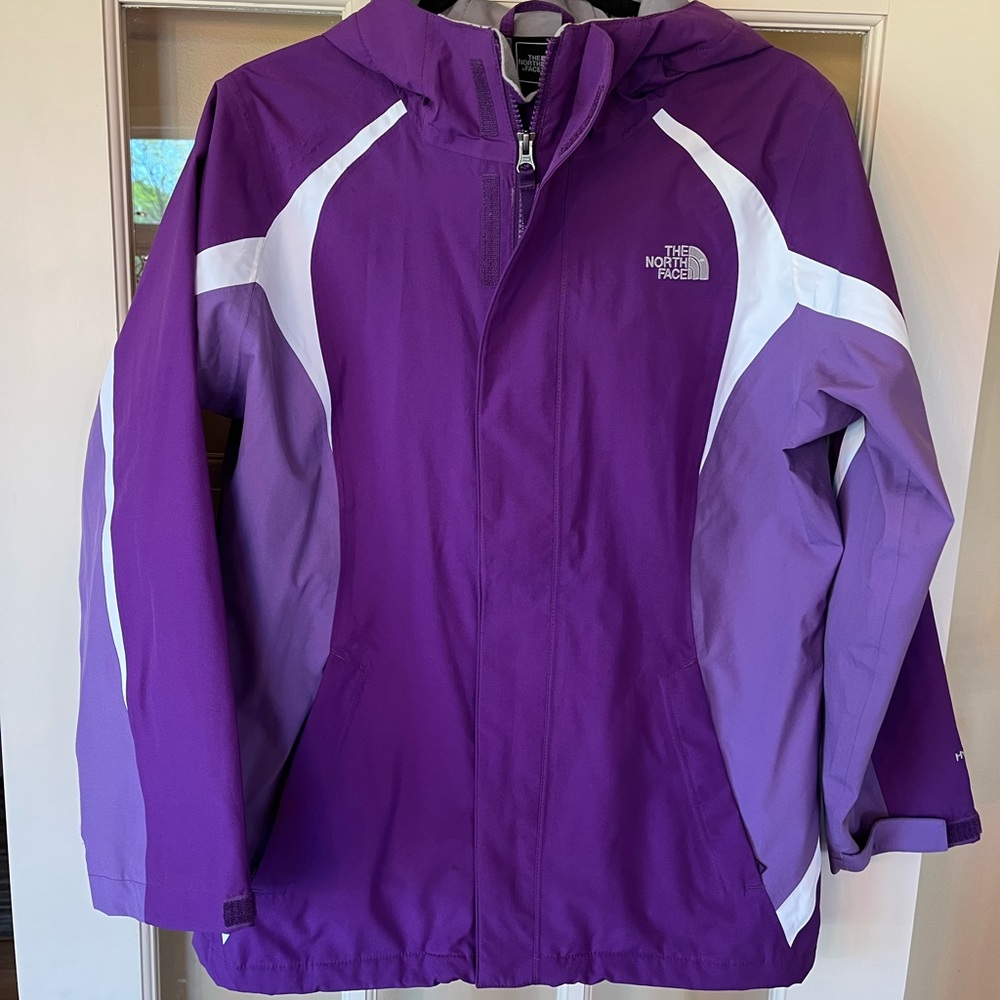 North face child’s jacket XL ( 18) with hoody, zippers, and Velcro.
